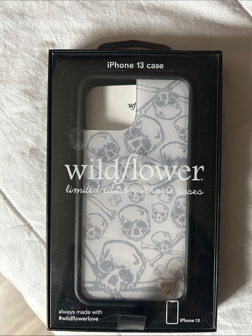 Wildflowers White iPhone 13 Case with Gray Skull Pattern